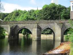 Three photographs of Elvet Bridge, from Browns boathouse, boats in foreground 2015
